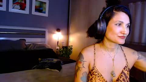 My alter ego Betinna Flowers - a tattooed Miss  -   Are you missing me come in here  -  online show from 02.26.25